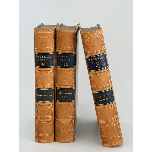 Three volumes of the Waverley Novels series. Nice decorative addition to a bookshelf or desk.