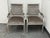 Design Plus Gallery presents a Pair of Louis XVI–Style Square-Back Armchairs. The chairs are showcasing a tailored...