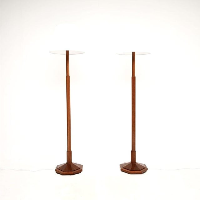 A superb pair of Art Deco walnut floor lamps, made in England and dating from the 1930’s. They are of outstanding quality,...