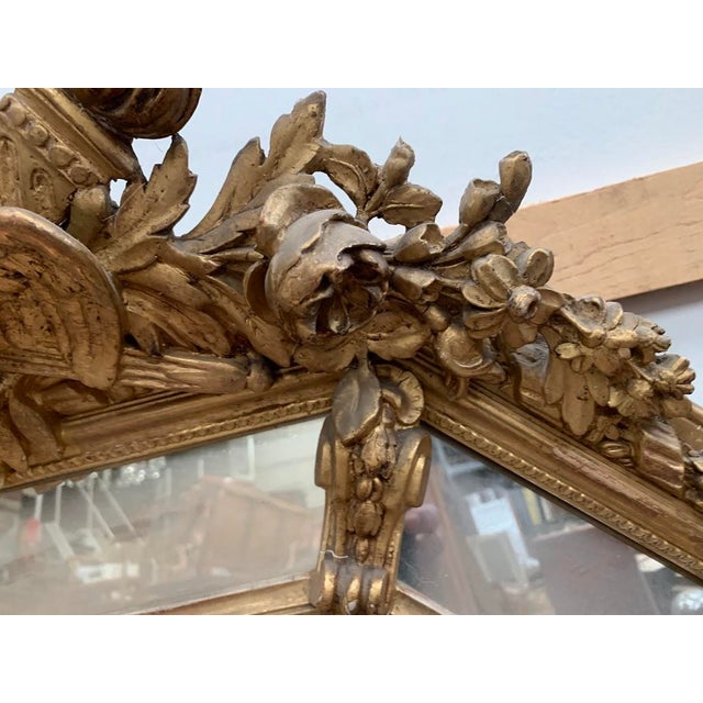 Very pretty Louis XVI style octagonal mirror Wood and gilded stucco Closed frame Lovely pediment decorated with doves,...