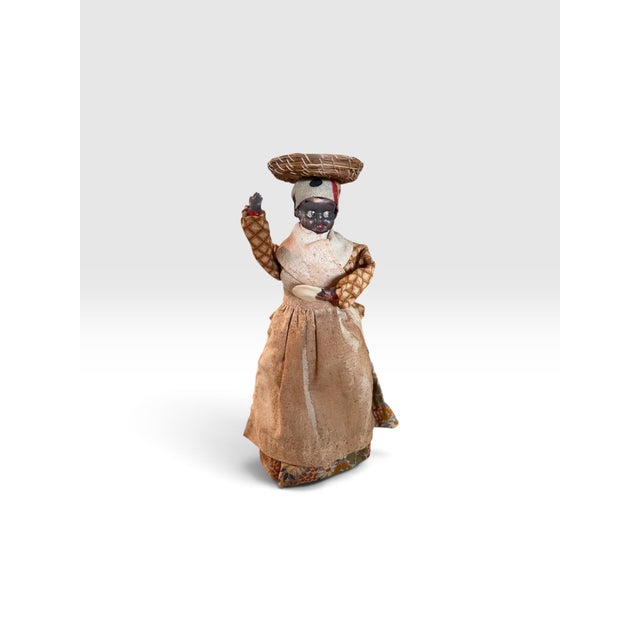 Exceptional antique Jamaican handmade folk-art doll dating to 1922, depicting a traditionally dressed market woman...