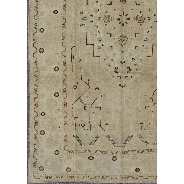 Measures: 7'9 x 12'8. Vintage Turkish Rug in Neutral Tones in Taupe and Brown Highlights 7'9" x 12'8". Keivan Woven Arts /...