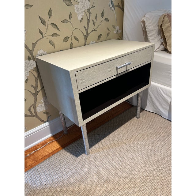 Luxurious Made Goods pair of contemporary cream shagreen end tables or night stands with streamlined profile and black and...