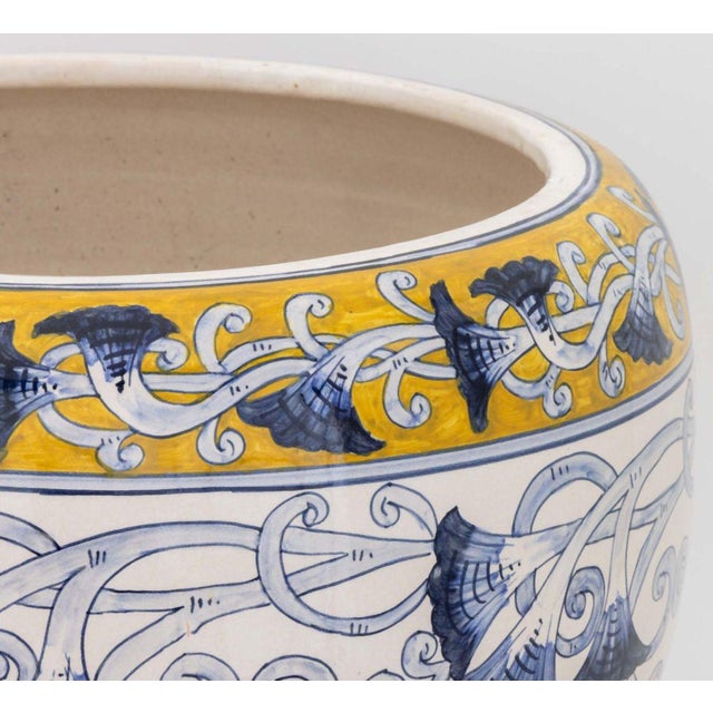 Italian Large Glazed Ceramic Jardiniere, blue and white scrolling flowering vines with yellow top border, marked "Deruta /...