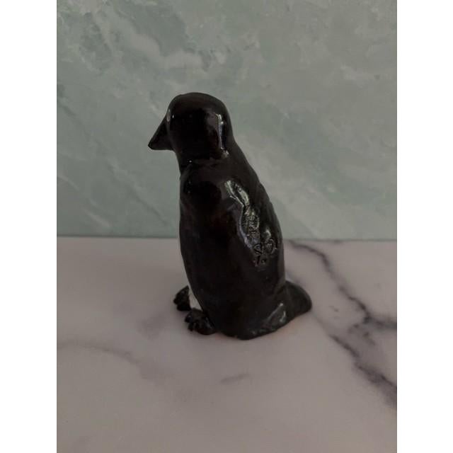Handcrafted ceramic penguin art figurine. Created by Peppertown Pottery and sold at the Mississippi Crafts Center, circa...