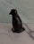 Handcrafted ceramic penguin art figurine. Created by Peppertown Pottery and sold at the Mississippi Crafts Center, circa...