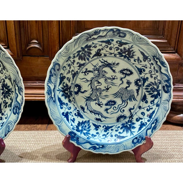 Pair of Oversized Chinese Blue & White Porcelain Charger Plates With Dragon & Phoenix Motif – 17.4” For Sale - Image 4 of 12