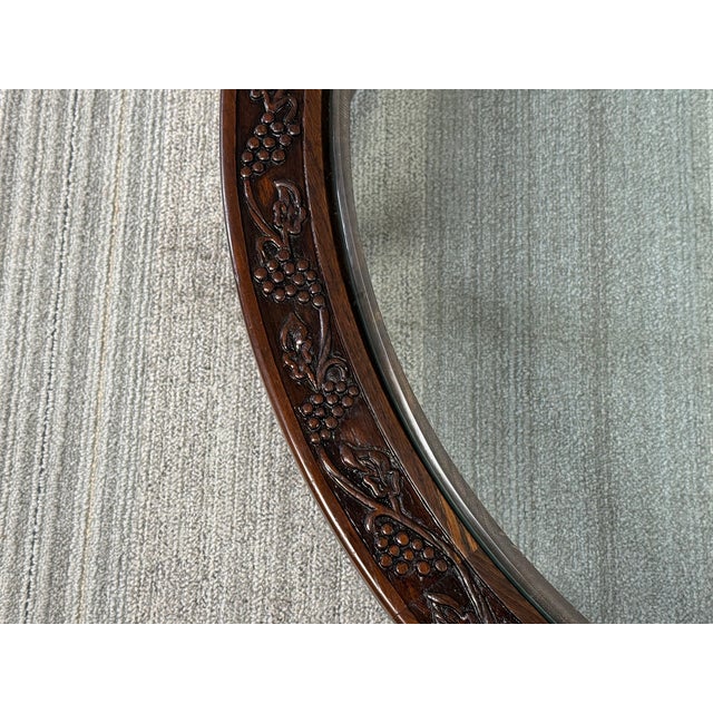 - This is a coffee table featuring an ornate carved grape/vine along the rim and an insert glass top - -VIKING OAK STYLE...