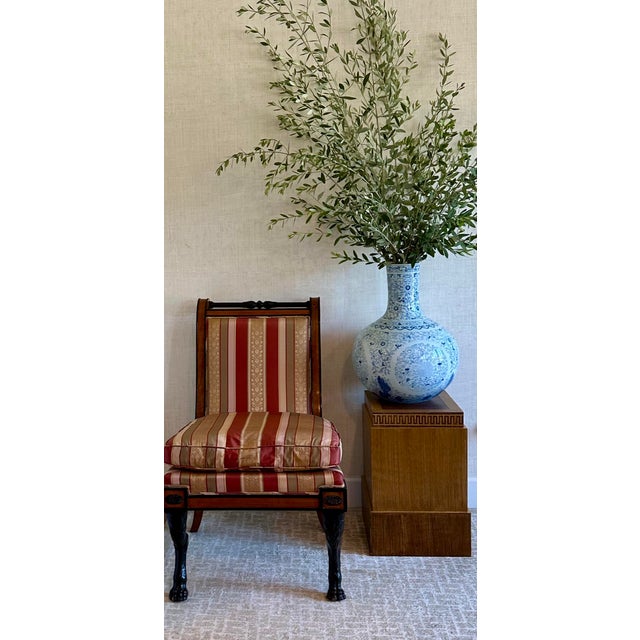 A fabulous pair of Mid-Century Art-Deco style pedestal stands. Hand-crafted with Neoclassical Greek keys and gold accents...