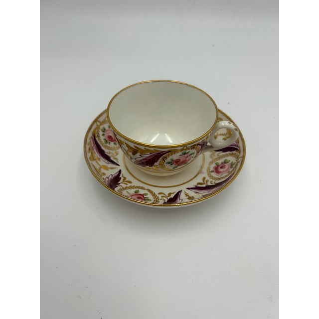 Fine Minton cup. "Sevres" mark characteristic of the early 19th century. Fine porcelain entirely hand-decorated. Minimal...