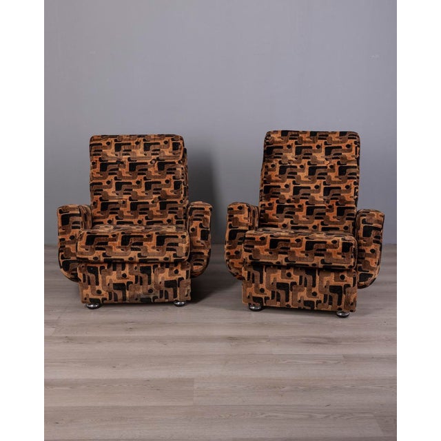 Pair of armchairs with wooden frame and multicoloured velvet upholstery, chromed metal feet and inserts, Italian design,...