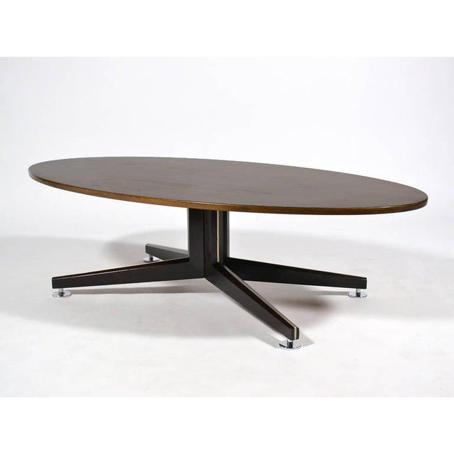 This stunning cocktail table by Edward Wormley exemplifies his refined sensibility and fine detailing as well as the...