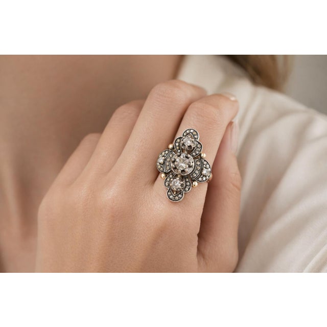 Discover the timeless elegance of our Vintage Buttercup Set Diamond Plaque Ring, a stunning piece crafted from 14k yellow...