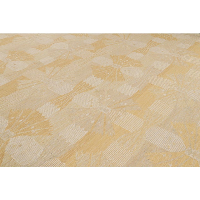 Handwoven in wool, this 14x18 Scandinavian flatweave rug features geometric patterns inspired by the Swedish Minimalist...