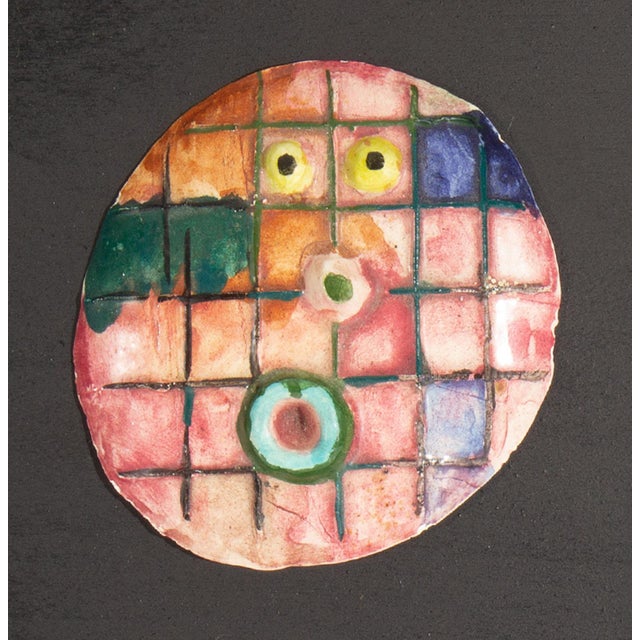 A 1970s ceramic tile by the American artist Mark Bulwinkle (born 1946). This ceramic piece depicts an abstract circular...