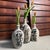 This vintage set of three tokkuri (Japanese sake bottles), dating to around 1940, has that restrained, functional presence...