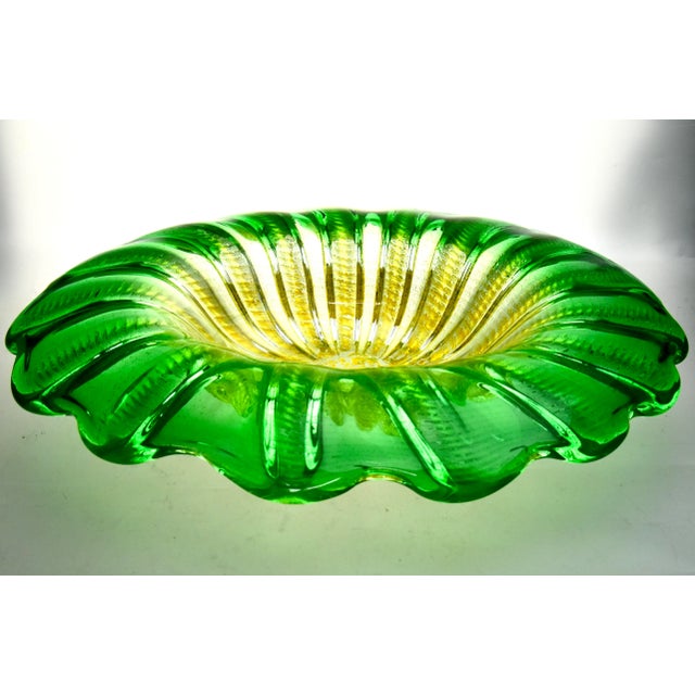 A magnificent heavy weight art Venetian glass statement bowl, attributed to Barovier Toso, hand blown and infused with a...