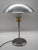 Scandinavian modern table lamp "ufo" in brushed metal and frosted glass. this model (type b0208) combines a dome-shaped...