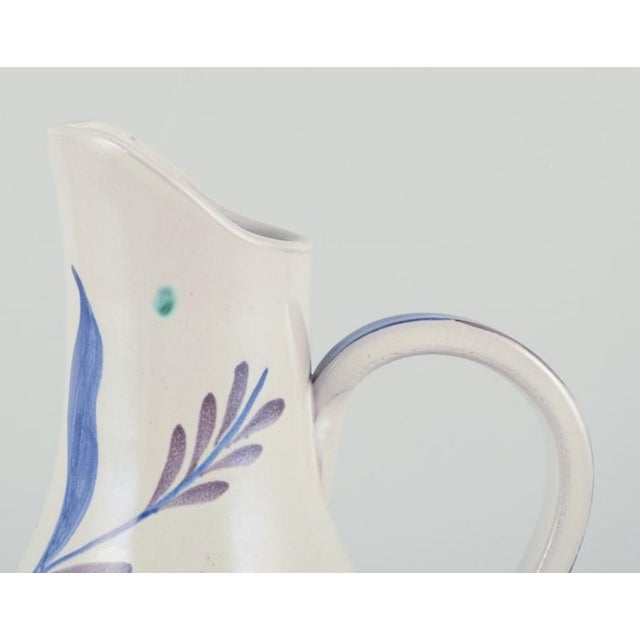 Nittsjö, Sweden. Unique ceramic vase. Hand-painted with floral motifs. Circa 1960. In perfect condition. Marked....