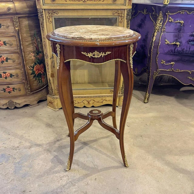 In love with the design. Beautiful side table with gold details. This table can be used for decoration in the hallway or...
