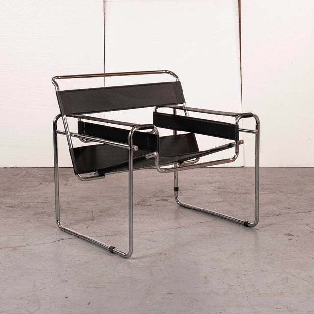 Pair of vintage Marcel Breuer Wassily style black leather and chrome chairs