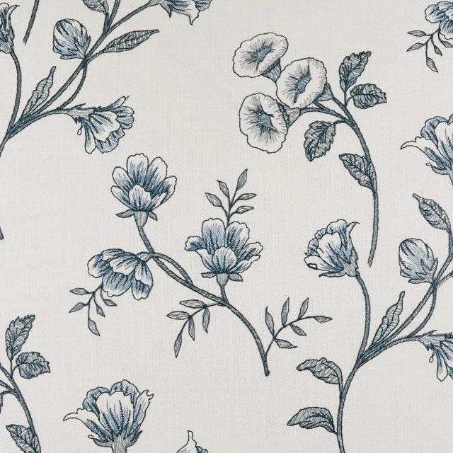The Tulah Blue throw pillow brings handcrafted detail and natural botanical motifs to your furniture with its embroidered...
