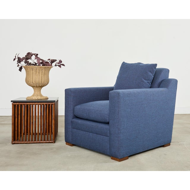 Handsome Italian club chair or lounge chair designed by Ralph Lauren. The "Raymond" club chair features a deep hardwood...