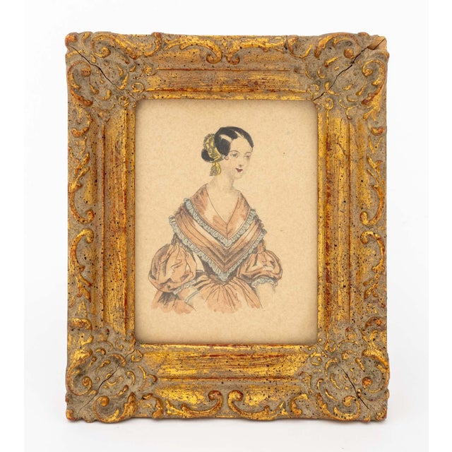 Two Victorian Miniature Fashion Portraits, Hand-colored Lithographs on Paper, 19th century, unsigned, ornate giltwood...