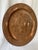 Large round Mexican mid century solid copper wall plaque, with hand hammered Mexican eagle emblem at center and Greek key...