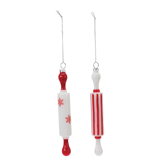 Bring a touch of holiday cheer to your home with this Set of Glass Rolling Pin Ornaments! These charming ornaments feature...