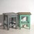A pair of antique bedside tables in pine wood, with a square top and four tapered legs tied by box stretchers. They...