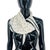 Yves Saint Laurent White Monogram Stretch Silk Scarf. Pleated (plisse) off-white square with scattered small black YSL...