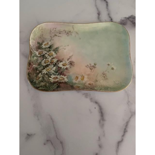 Sweet and lovely porcelain vanity or serving tray decorated with a bevy of daisies (Marguerites). Signed Limoges, France...