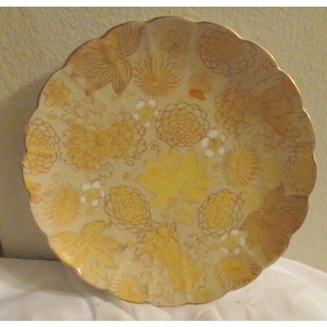 This bright pair of Imari Shuho plates is ready for installation in your favorite area. The yellow chrysanthemums, mums...