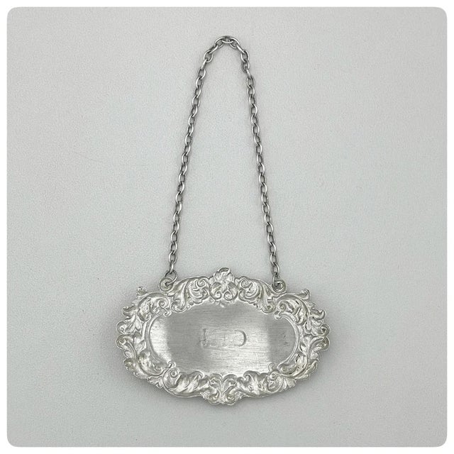 4 1/2" height including chain, 1 5/8” height of tag, 2 1/2" width.