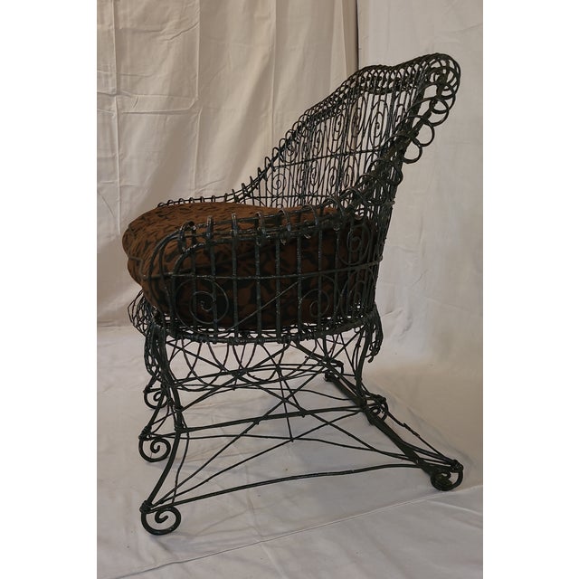 This is a traditional, English countryside, wire, outdoor settee with custom re-upholster cushion. It can be used indoor...