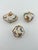 Three ceramic butterfly trinket boxes. These items are pre owned so please see all pictures and ask any questions.