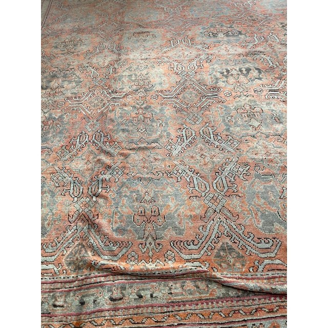 An exceptional oversized antique Turkish Oushak rug, dating to circa 1900, this piece exemplifies the effortless elegance...