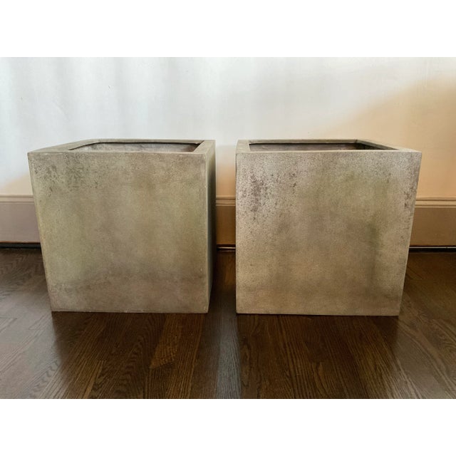 A wonderful pair of 20-inch planters. Made out of fiberglass, they don’t have the weight of concrete, but the patina sure...