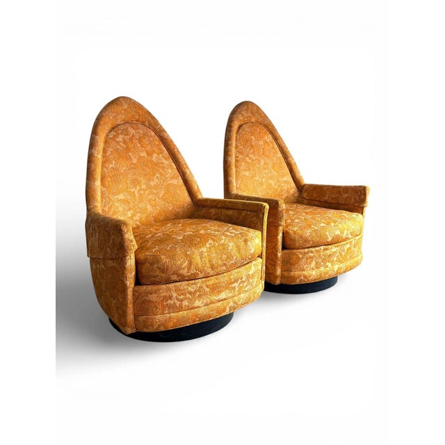 Authentic pair of 1960s mid century modern swivel lounge chairs by Selig. These vintage Selig chairs feature the classic...