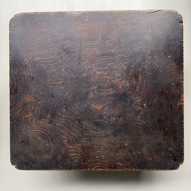 This antique low table from Japan has a strong, quiet presence: a compact rectangular top with softly rounded corners, set...