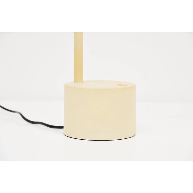 Rare ‘Halo Click 2’ table lamp designed by Ettore Sottsass for Philips, Holland 1988. This rare off-white table lamp was...