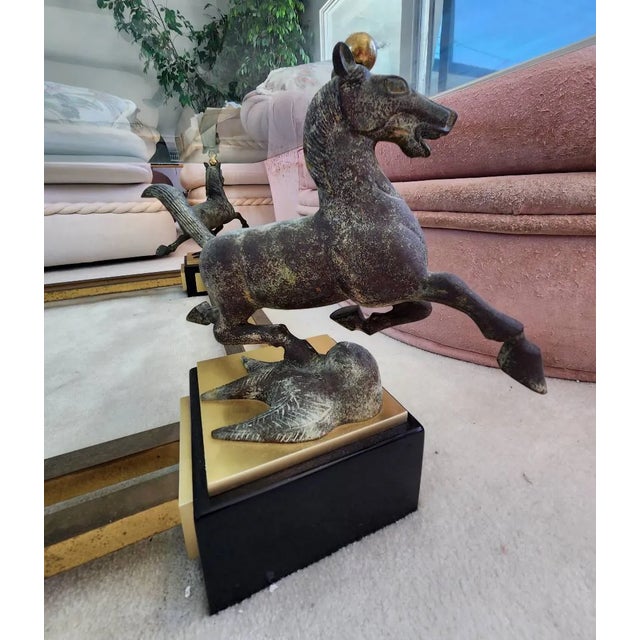 VINTAGE MAISON CHARLES FLYING HORSE OF GANSU GLASS TOP COCKTAIL TABLE. The glass on this table is in very good condition...