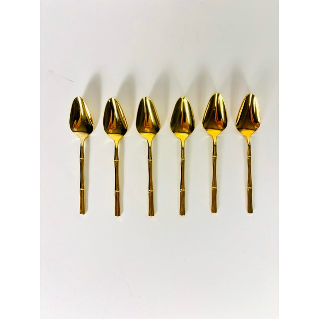 Bring a touch of vintage glamour to your coffee service with this elegant set of six gold electroplated demitasse spoons...