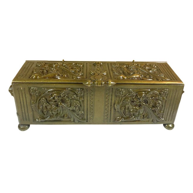9” long 2.5” wide 3” high, very heavy bronze box with bats or goblins in high relief all around, the more I look at it I...