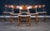 Set of six dining chairs featuring solid oak frames with beautifully shaped teak seats and backrests. The chairs showcase...