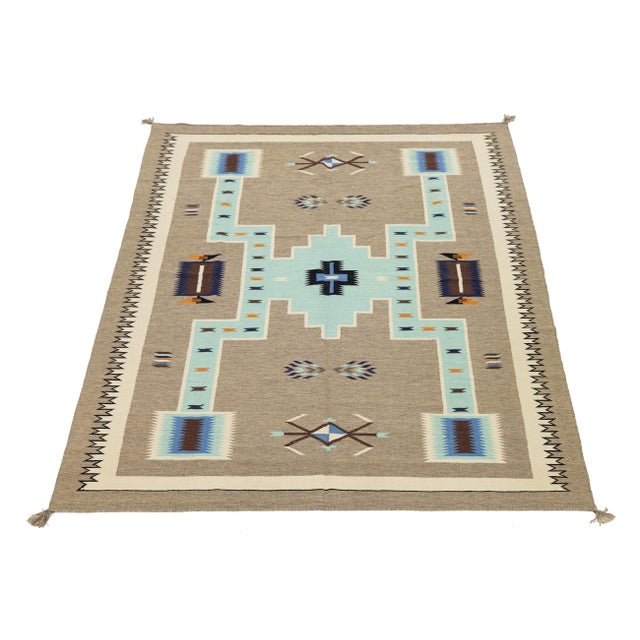 Elevate your space with this stunning Modern Navajo-style hand-knotted wool rug. Featuring a sophisticated palette of...