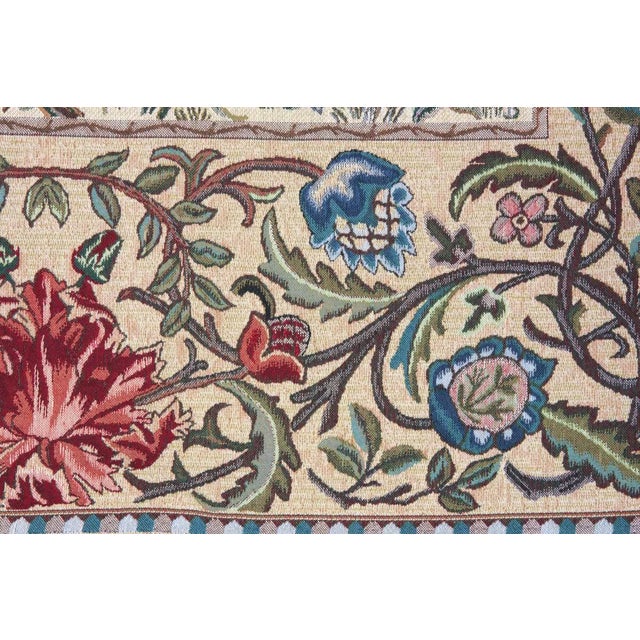 This tapestry is also known as The Tree of Life and is from an embroidered wool portiere designed by John Henry Dearle...