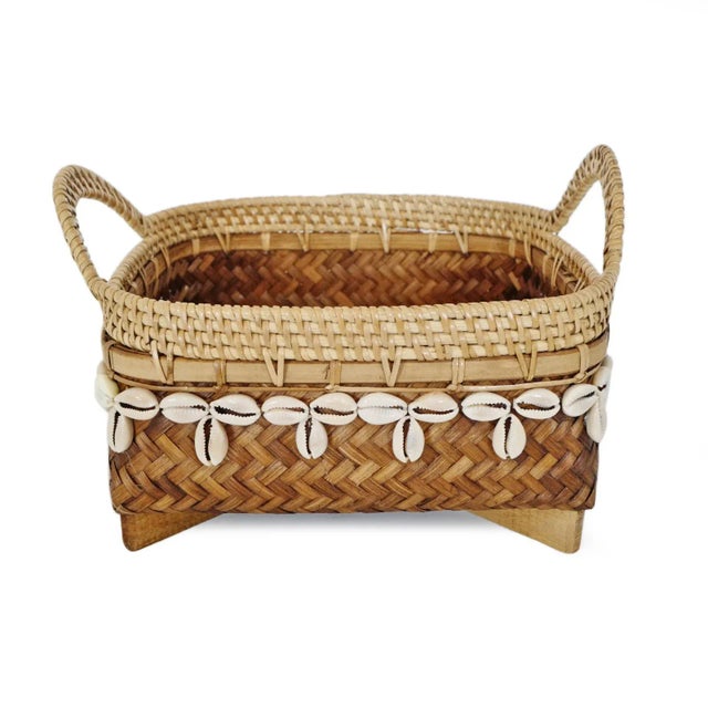 Beautiful vintage charming hand woven bamboo, rattan, and cowry shell basket. Each is slightly unique and sold individually.