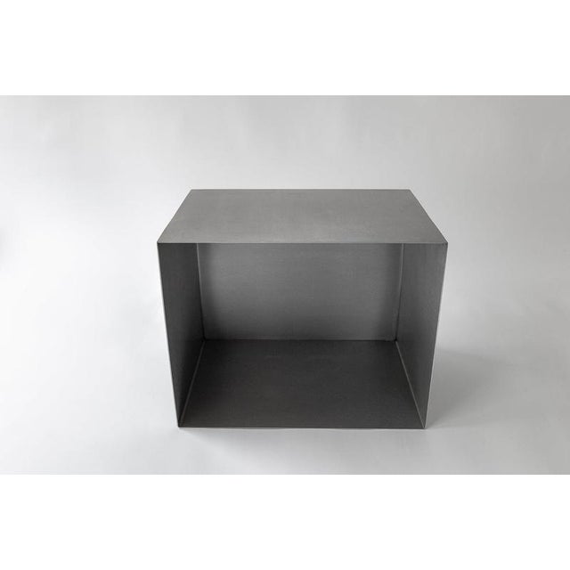 Sonar cube multifunction furniture in brushed stainless steel by form & eisen dimensions: d 35 x w 50 x h 40 cm....